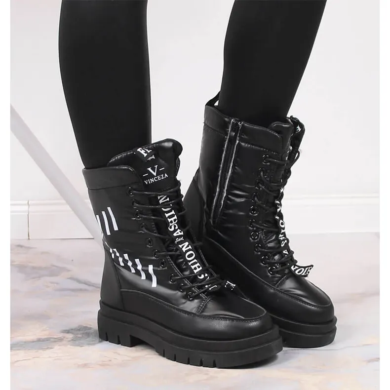 Women's lace-up snow boots with a black Vinceza platform